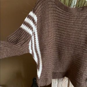 🍒.  Brown and white sweater